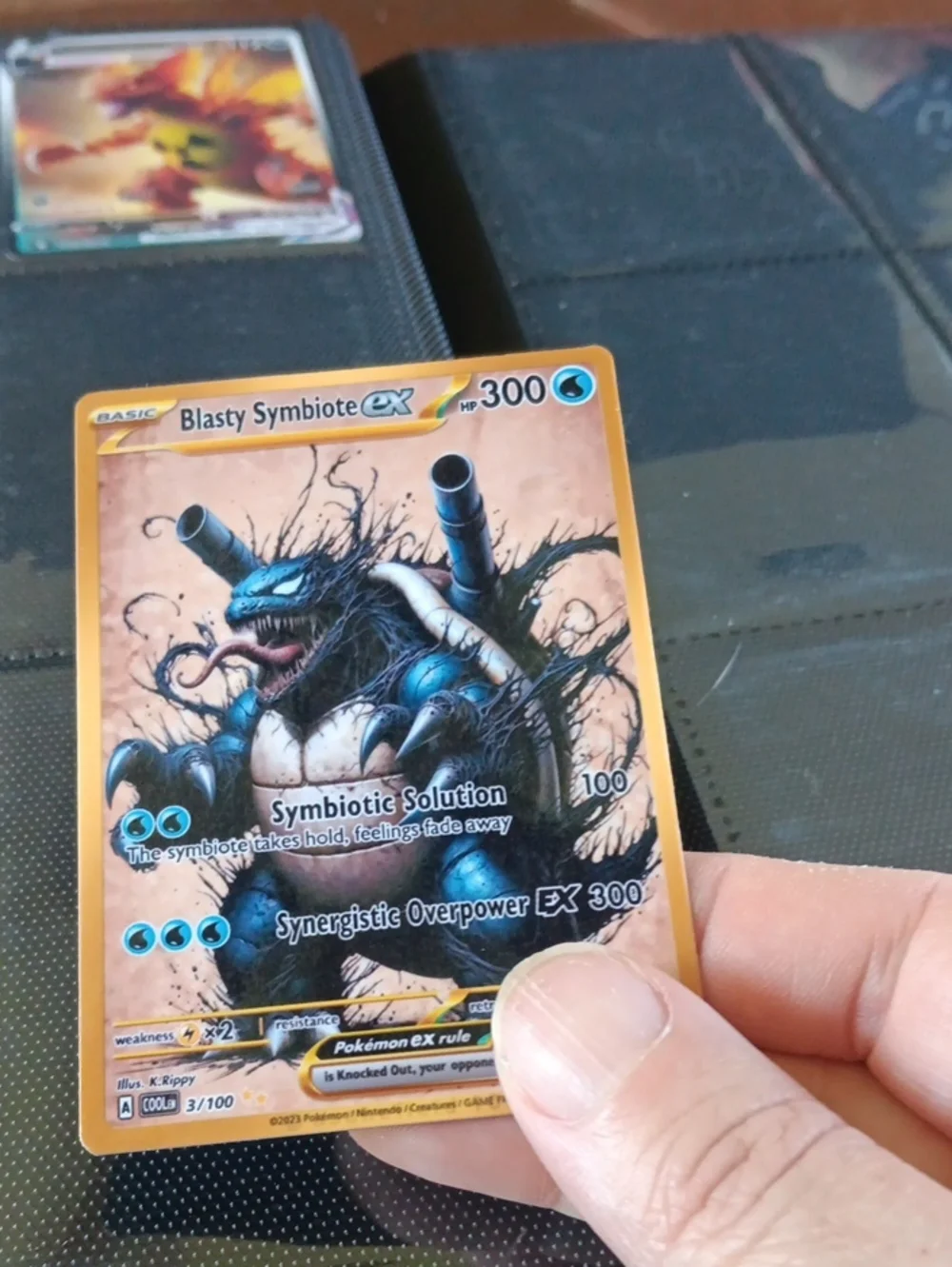 Blasty Symbiote EX Pokémon Trading Card - Blue, Gold Border